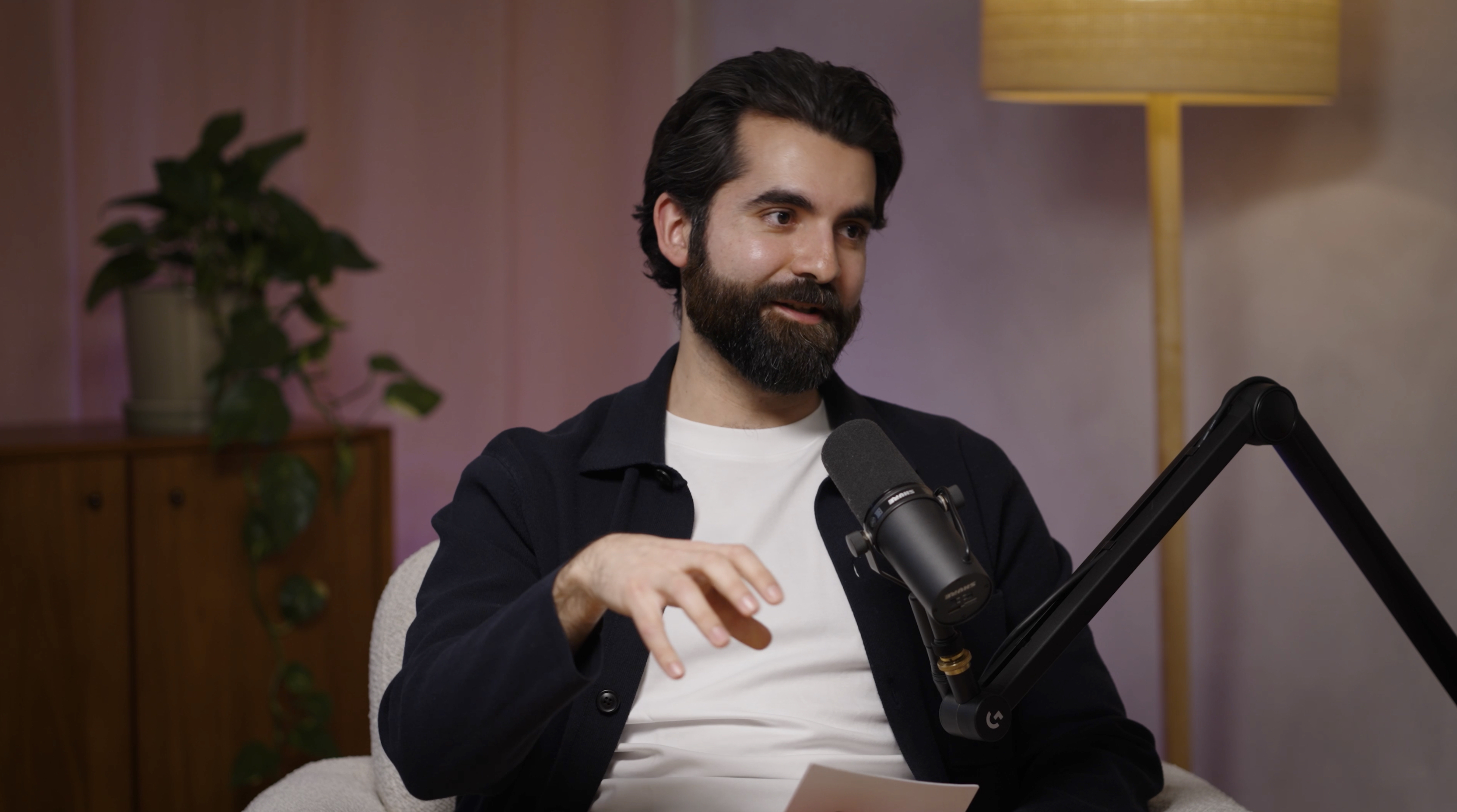 Alex Karim recording a podcast episode